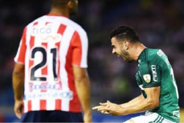 Bruno Henrique comemora após marcar para o Palmeiras contra o Junior.(Imagem:Getty Images)