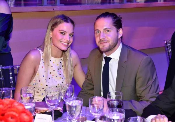 A atriz Margot Robbie e o produtor de cinema Tom Ackerley.(Imagem: Getty Images)