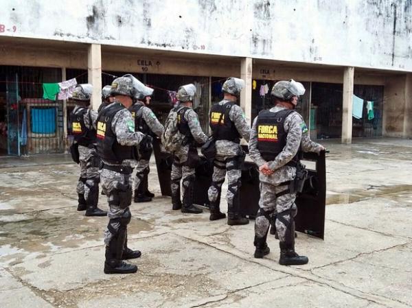 Policiais da For&ccedil;a Nacional no interior da Irm&atilde;o Guido.(Imagem:Divulga&ccedil;&atilde;o/Sejus)