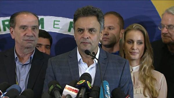 Aécio deseja sucesso a Dilma e diz que prioridade é unir o Brasil